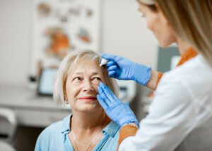 Older Woman Getting Eye Drops (2)